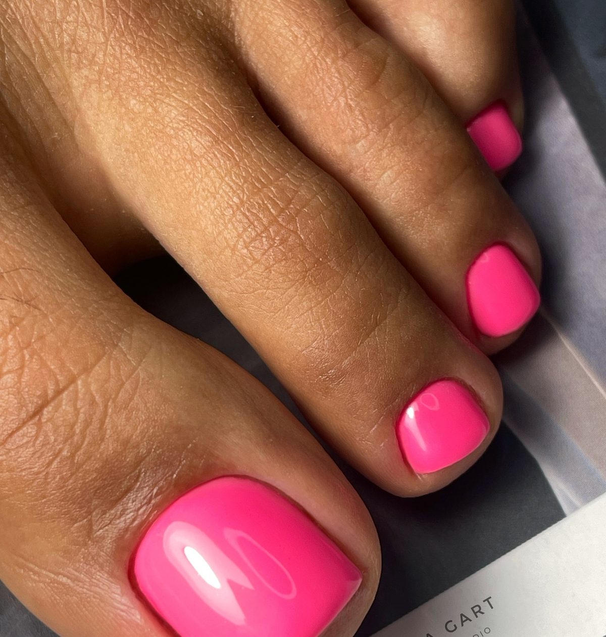 Bright pink pedicure by Julia Gart Nails Studio